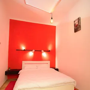 https://red-and-yellow-apartment-modern.hotelslviv.net